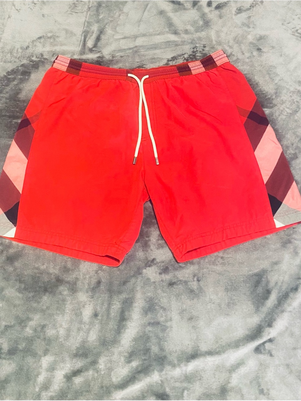 Classic Burberry Red Swim Trunks with signature plaid side panels